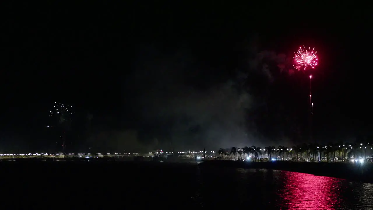 Fireworks going off in the Distance on New Year's Eve in Panama City Panama