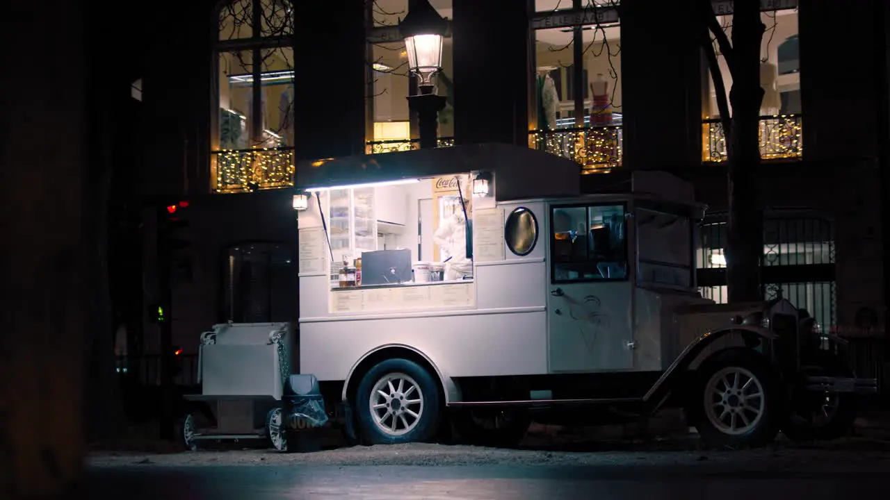 Vintage food-truck parked and ready to serve customers nighttime