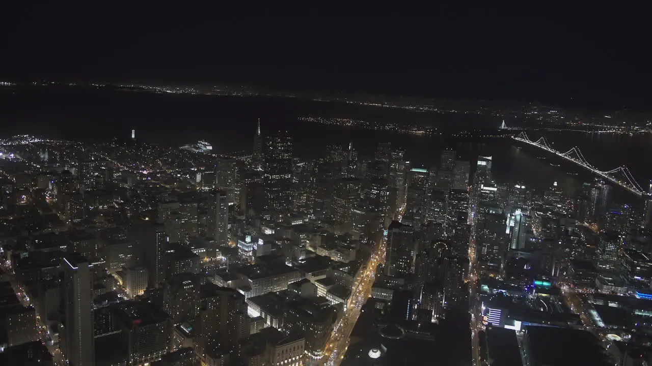 A city is seen from above at night