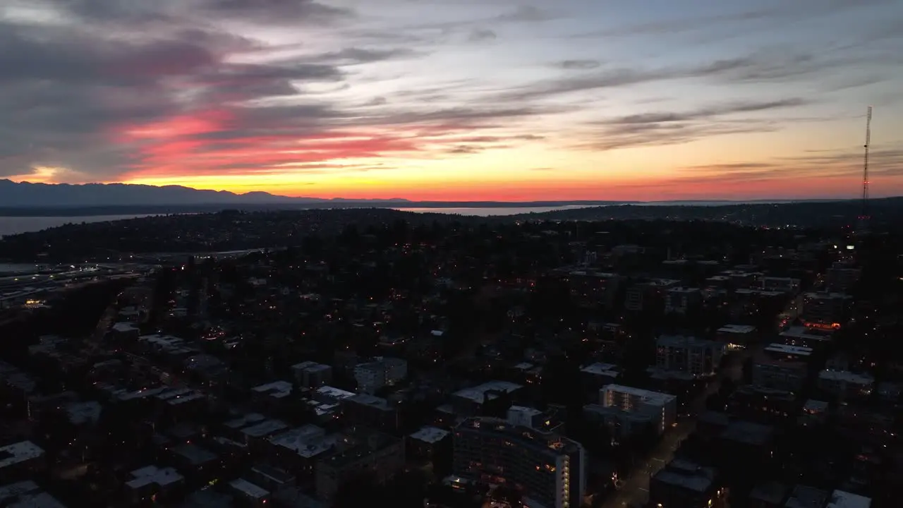 Aerial view of the sun setting over Seattle's Queen Anne neighborhood