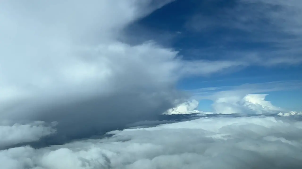 Aerial view from a jet cockpit of a beautiful sky with cumulus