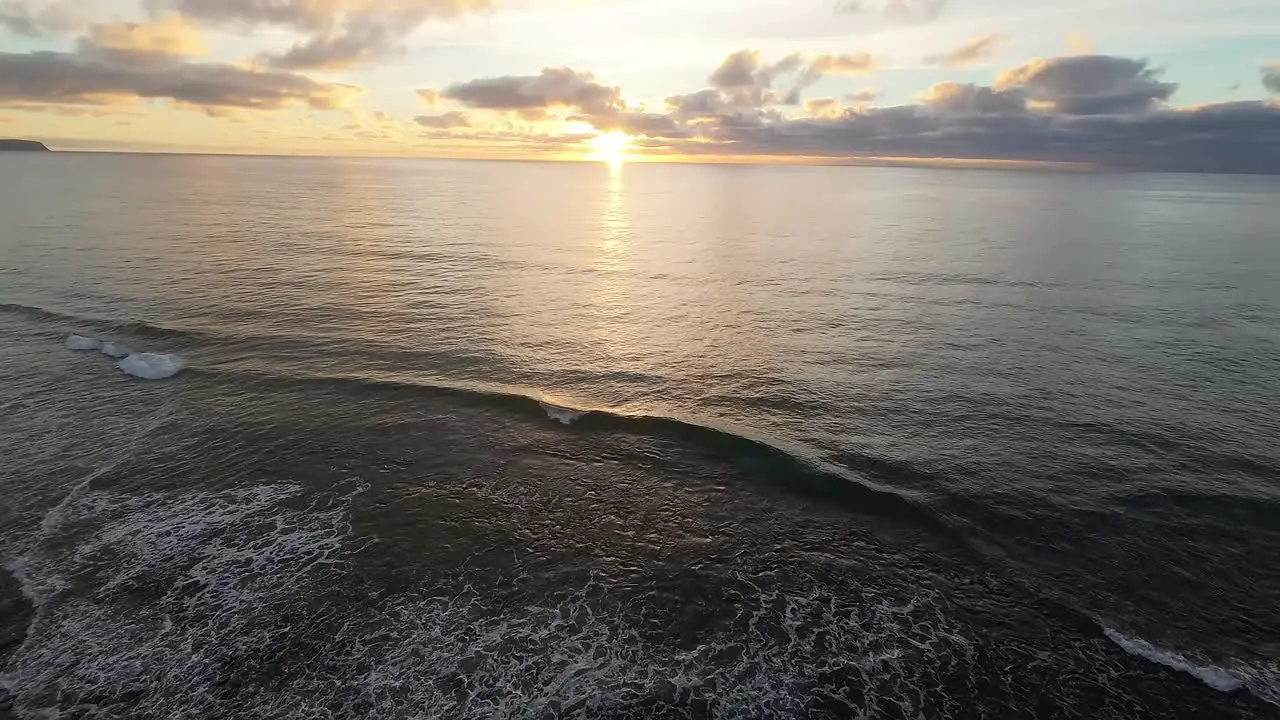 Drone zoom out view of the ocean and a wild beach in Porto Santo