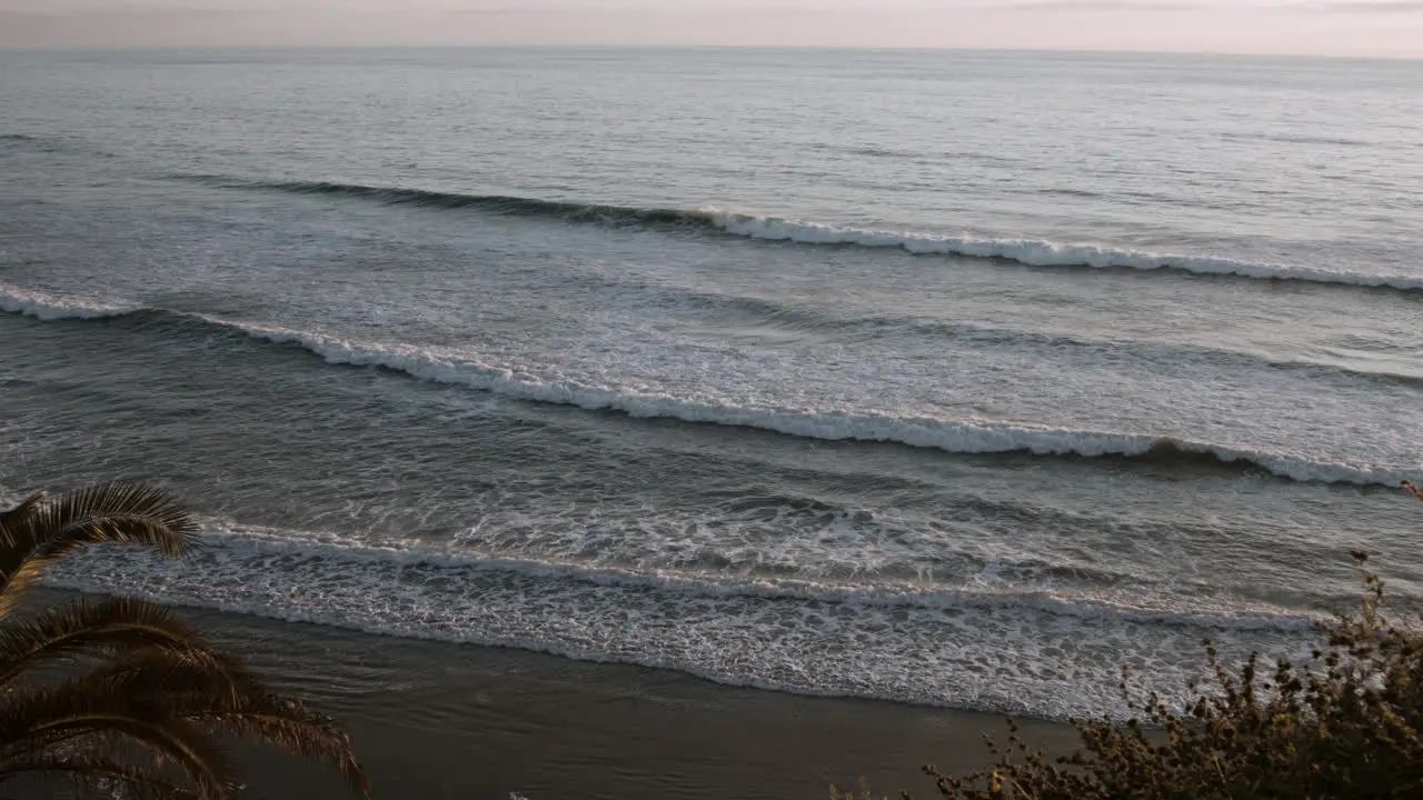 A view of the ocean waves during sunset at Swamis Beach in Encinitas California