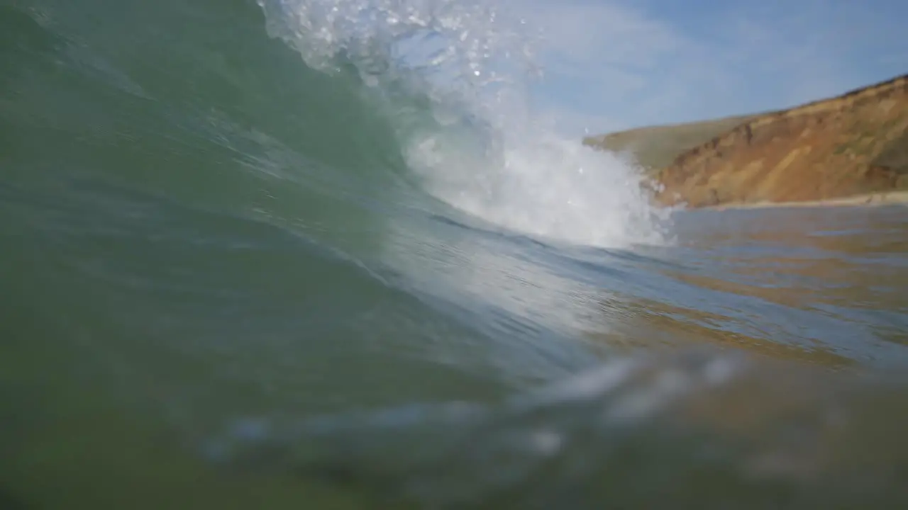 Barrel shot of wave crashing