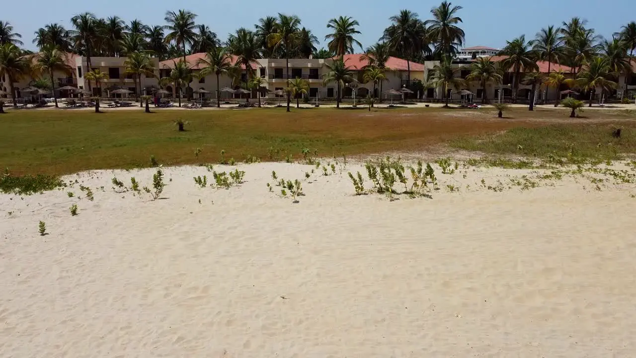 Forward ascending dolly view of Ocean Bay Hotel Cape Point Bakau in The Gambia