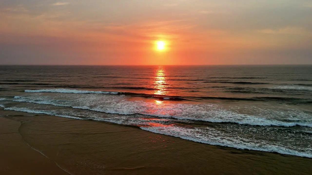 Captivating Sunset Over Serene Ocean Waves A Tranquil Display of Warm Hues and Gentle Tides