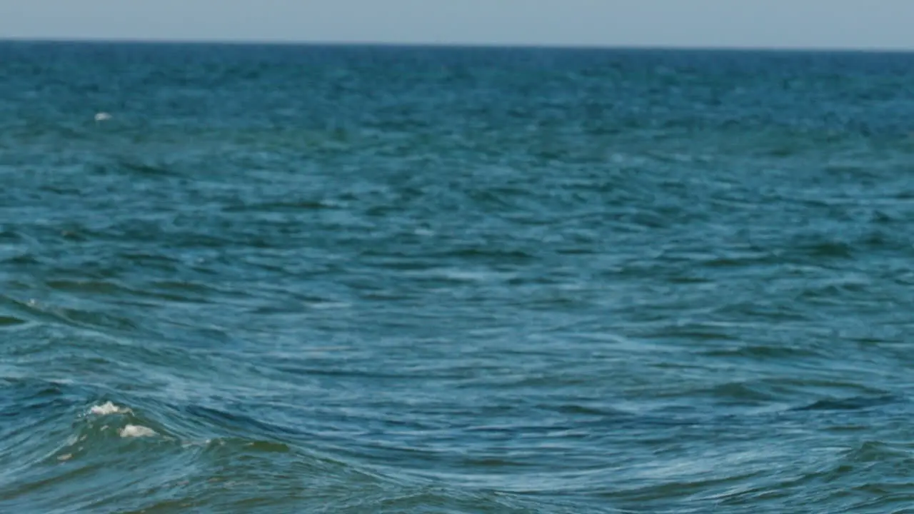 The undulating surface of the ocean capturing the subtle movement of calm sea waters