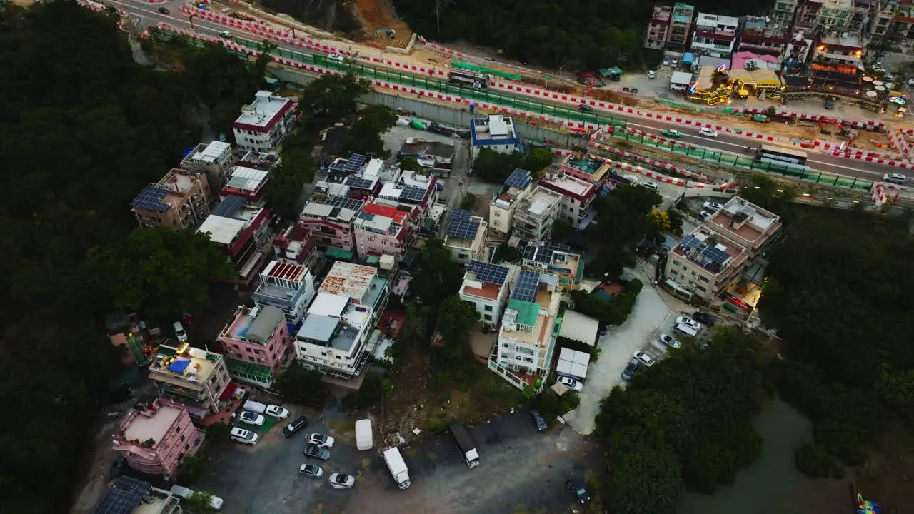 Wonderful static aerial view of a local group of houses next to a road