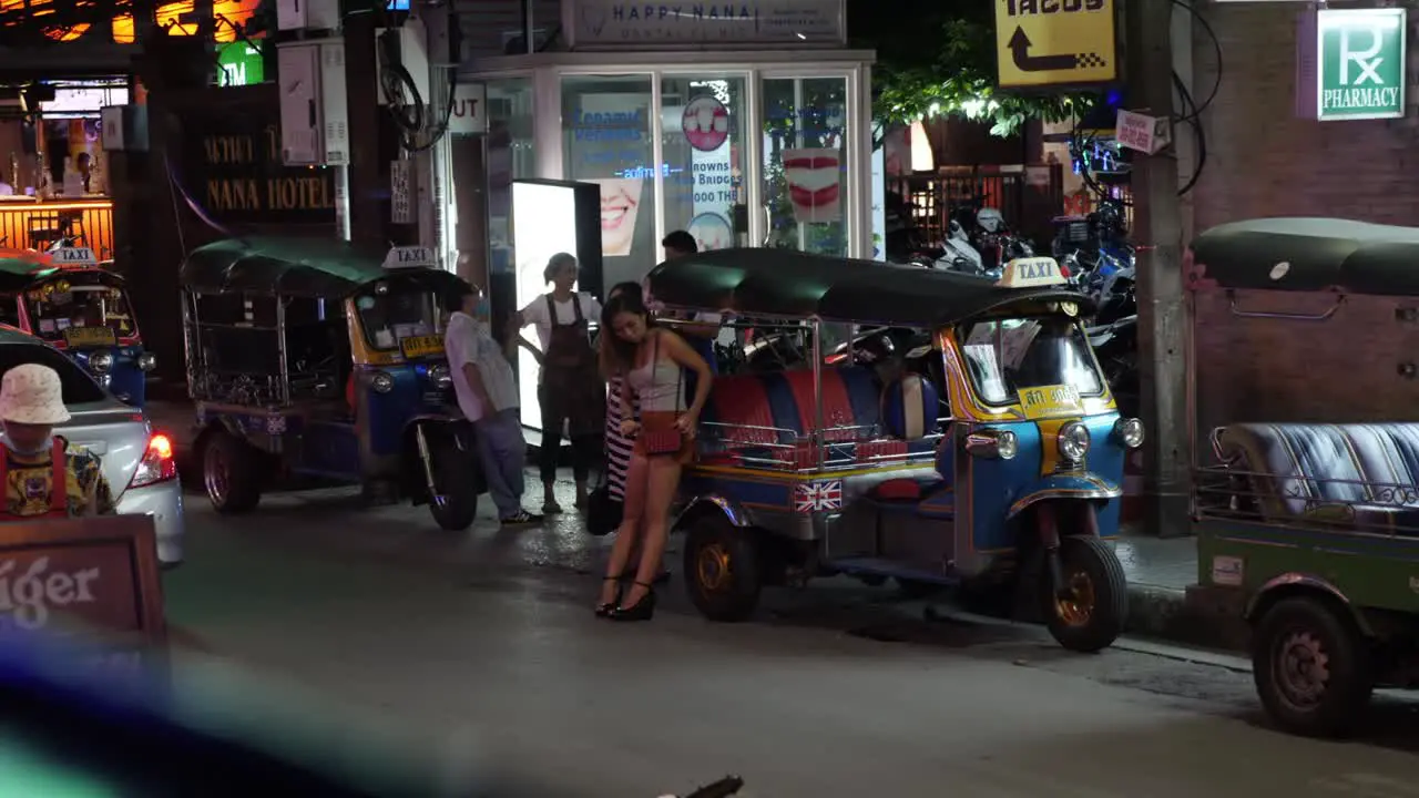 Ladies of the night Standing next to a tuk tuk in Nana Plaza soi 4 Bangkok