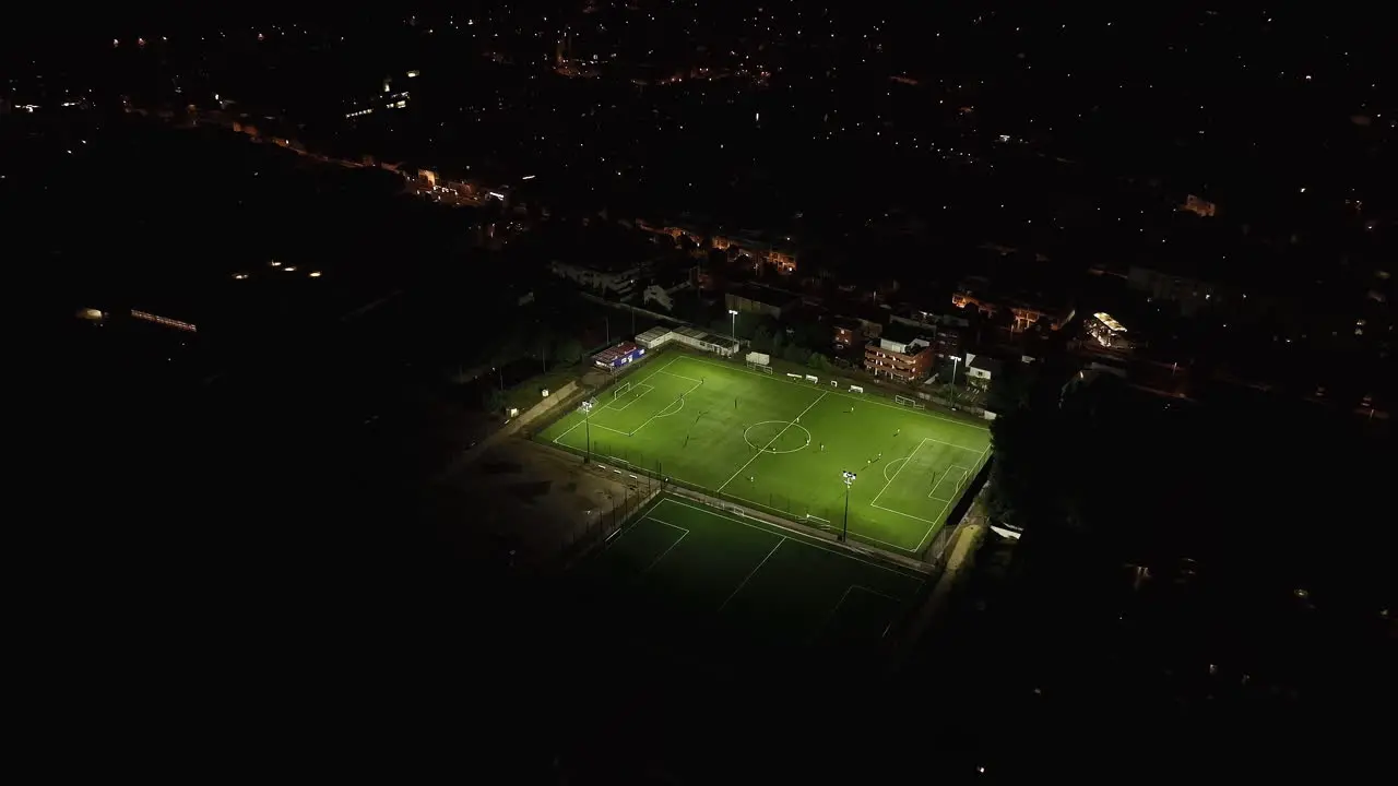 Nighttime aerial views of Montpellier Castelnau-le-Lez and football fields