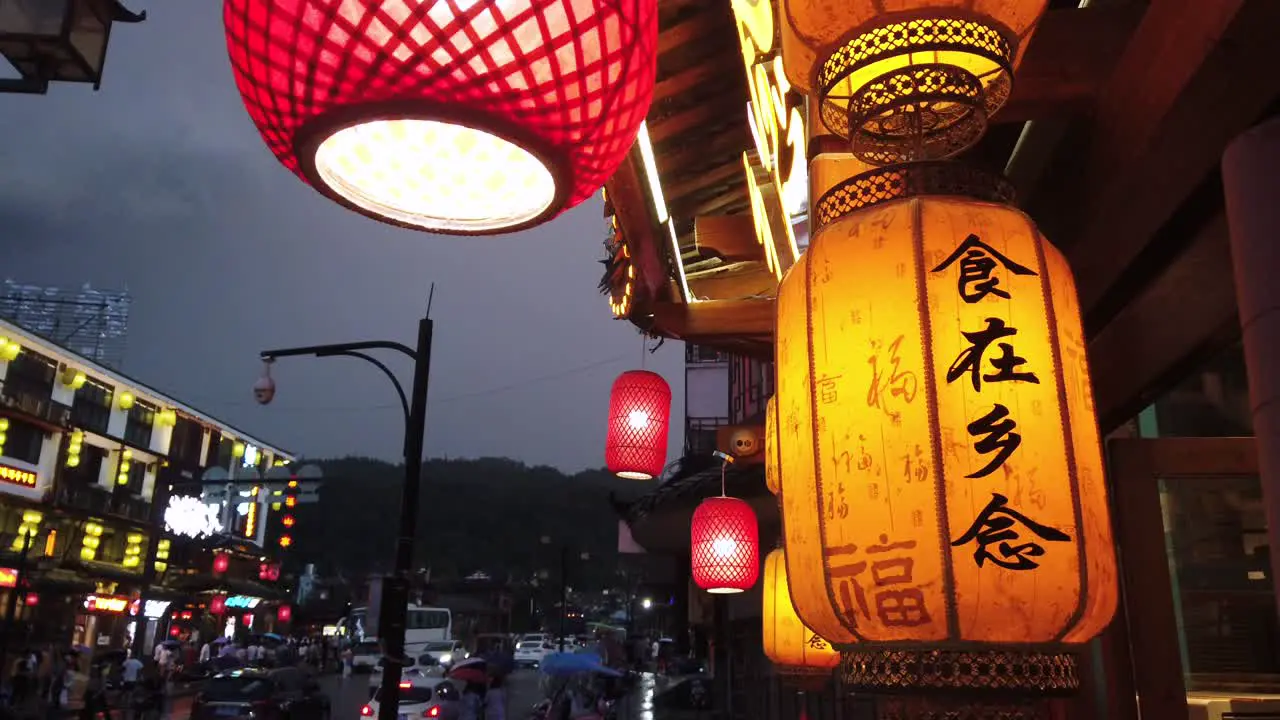 Wulingyuan China August 2019  Variety of colourful Chinese Paper Lanterns hanging from buildings in a street