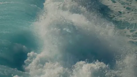 Tracking Shot of Waves Crashing Off the Coast in Bali