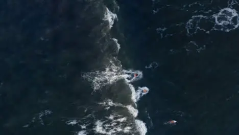 Drone Shot Looking Down and Following Wave 