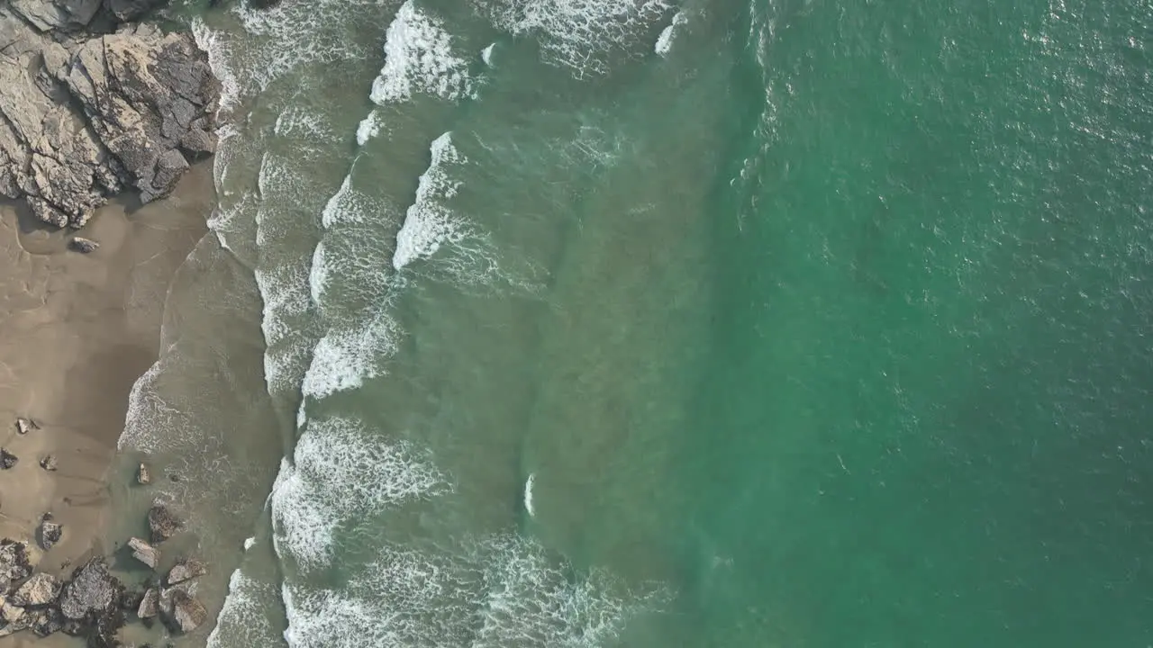 Trebarwith beach Cornwall aerial flight looking down to beach and waves mavic 3 cine prores 422 Clip 4