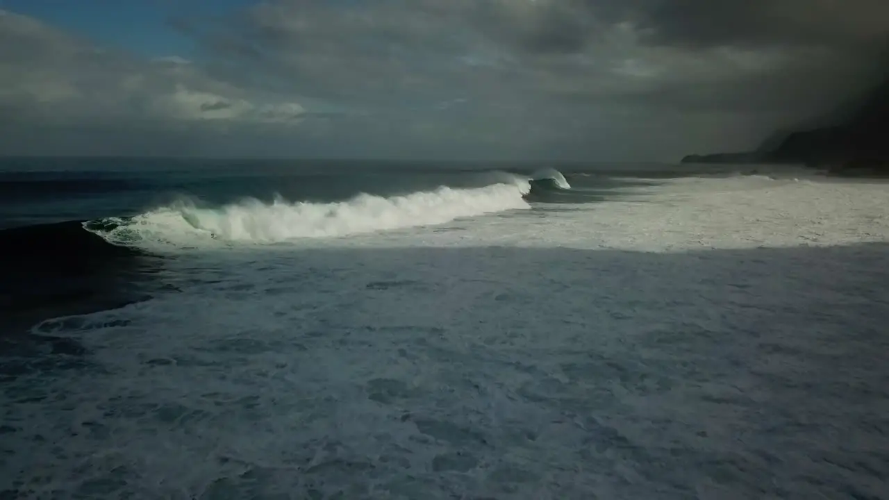 Drone shot of the waves near the beach of Madeira