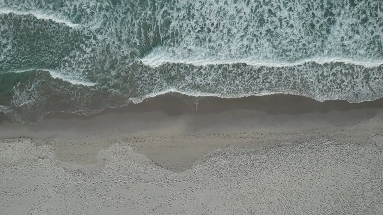  Aerial view drone over beach sea with powerful sea waves