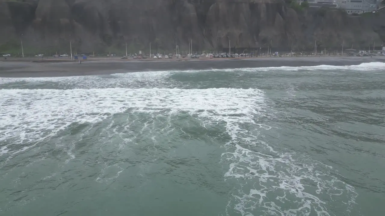 Aerial dolly shot of the turquoise sea off