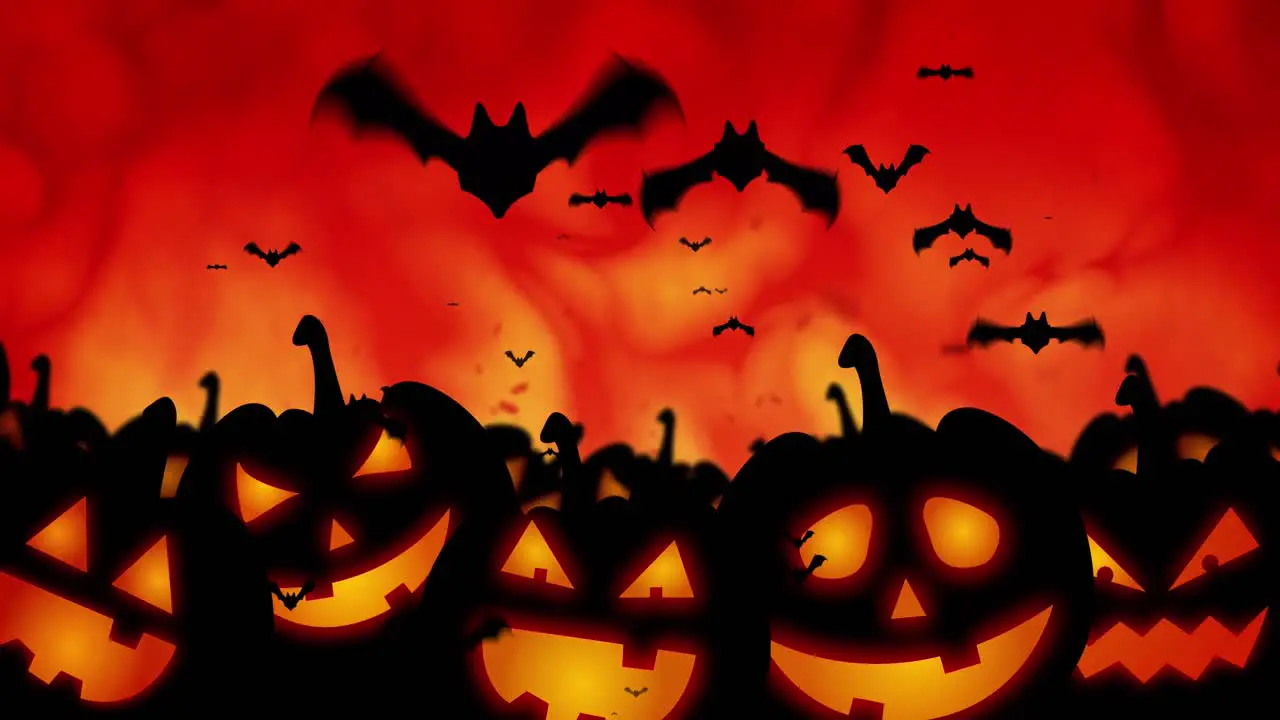 Animation of bats flying and pumpkins over fire