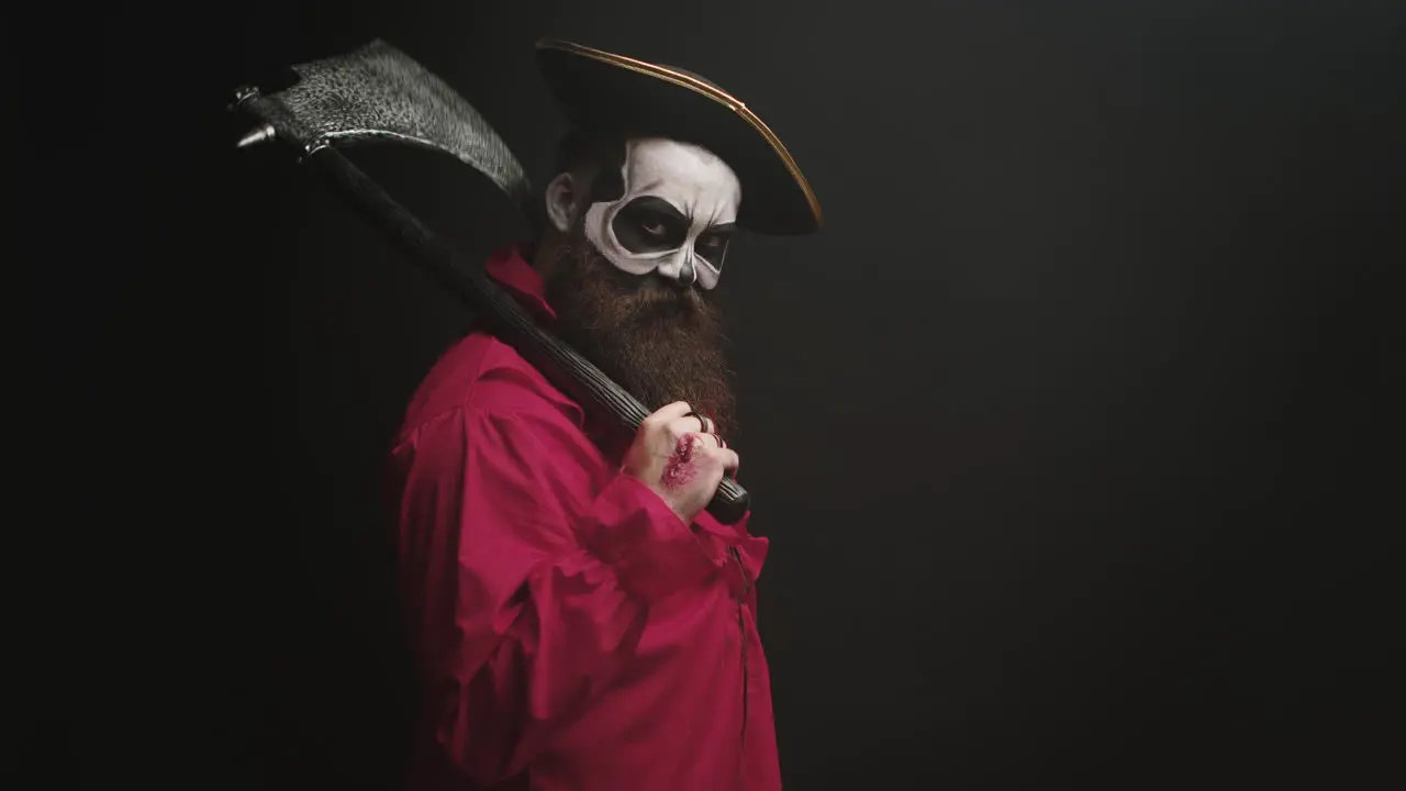 Crazy man with make up dressed up like pirate