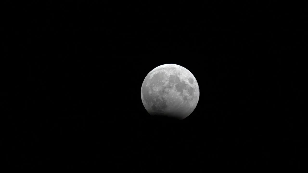 Time lapse of partial moon eclipse at october 2023