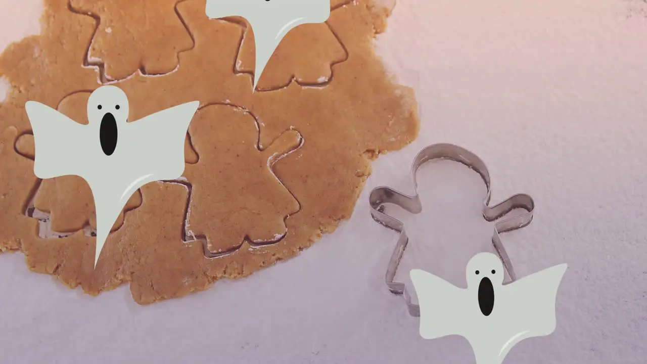 Animation of ghosts over cookies dough and mold