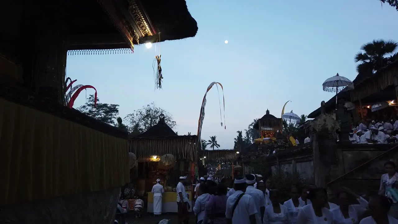 Balinese People Gather under the Full Moon in Temple Ceremony at Pura Samuan Tiga Hindu Ceremony Bali Indonesia Southeast Asia