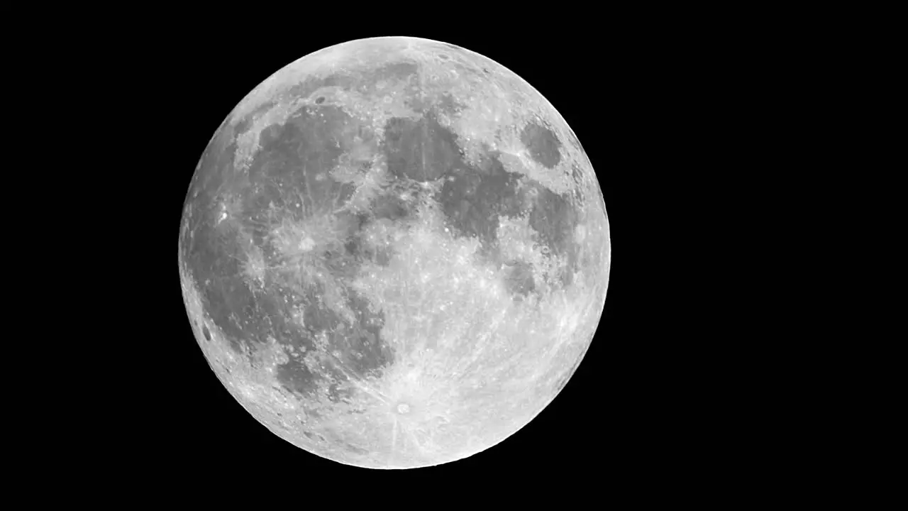 Supermoon moving across the night sky