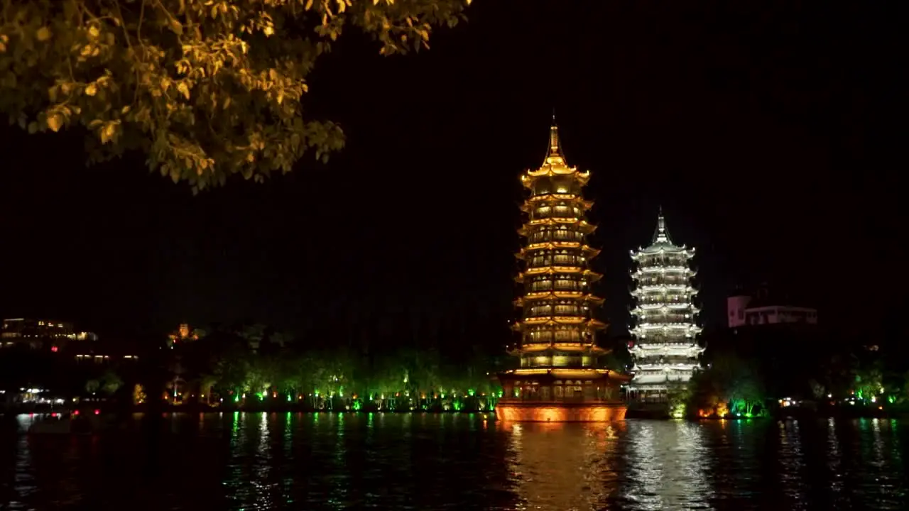 Urban Guilin at night near the lake Sun and Moon Pagodas