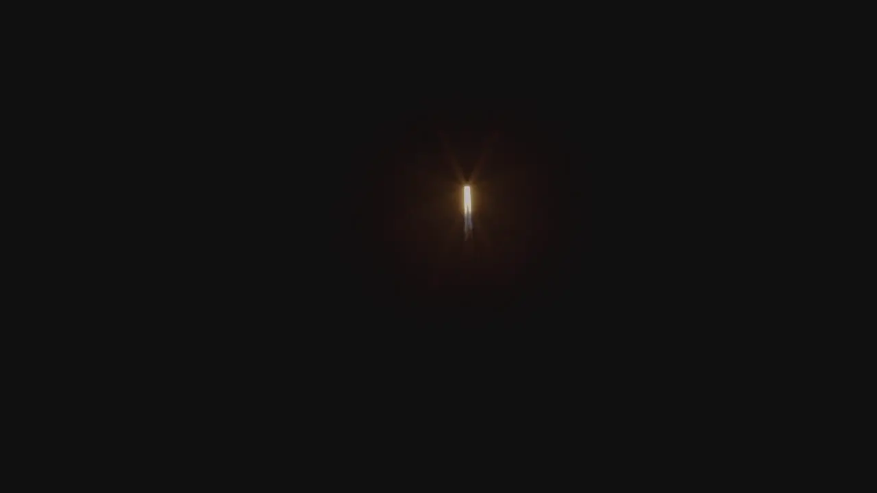 A firework is shot into the night sky