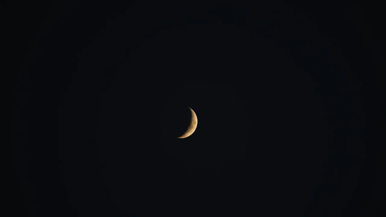 Crescent Moon In The Night Sky