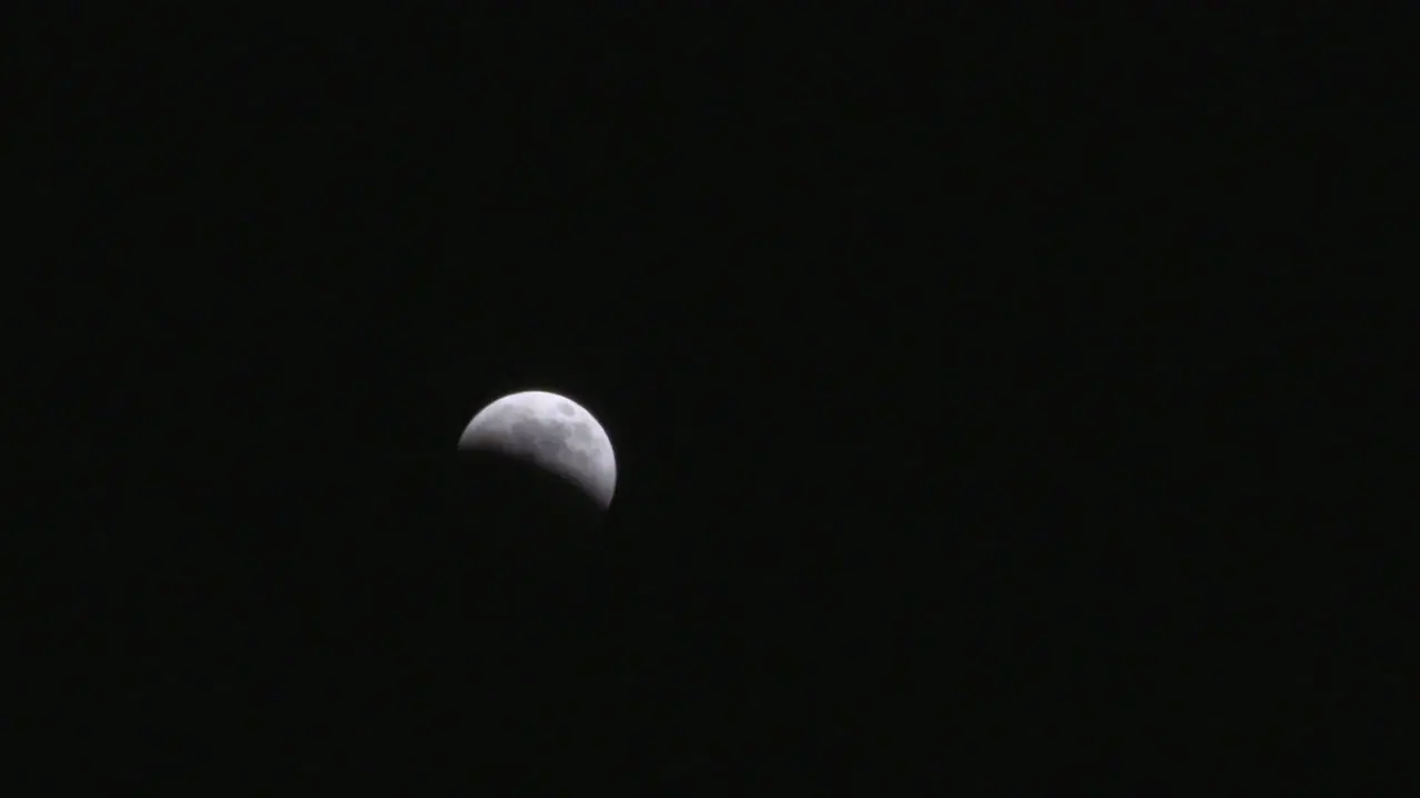 Spectacular time lapse footage of a total lunar eclipse in a clear night sky