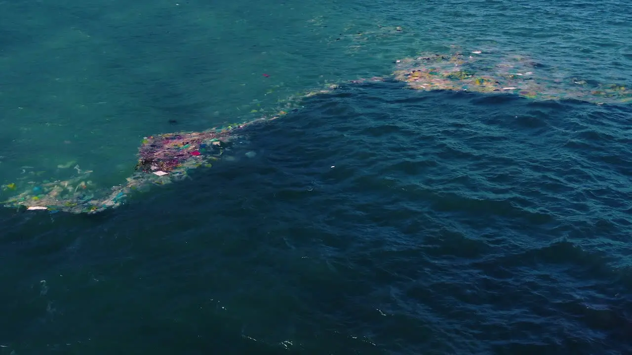 Accumulation Of Plastic Rubbish Floating In The Sea