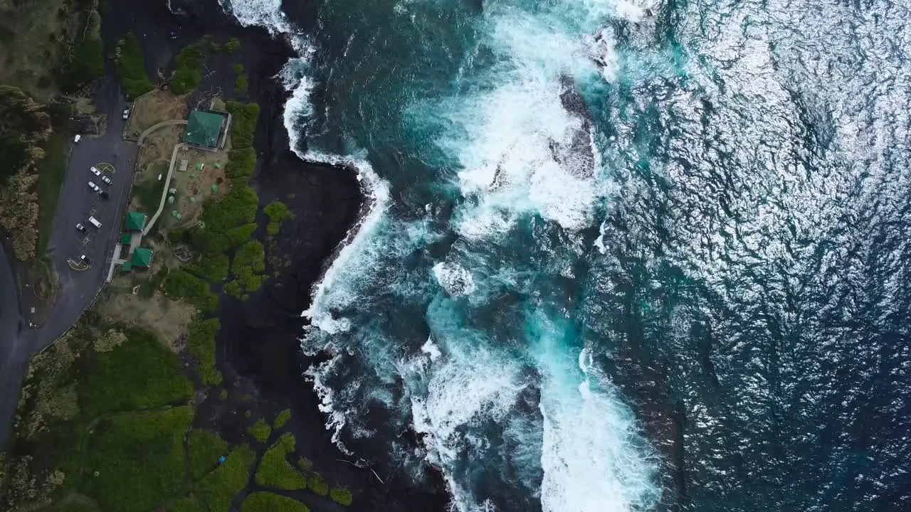 The Big Island of Hawai'i housing beautiful contrasts of black green and blue all shown from above-9