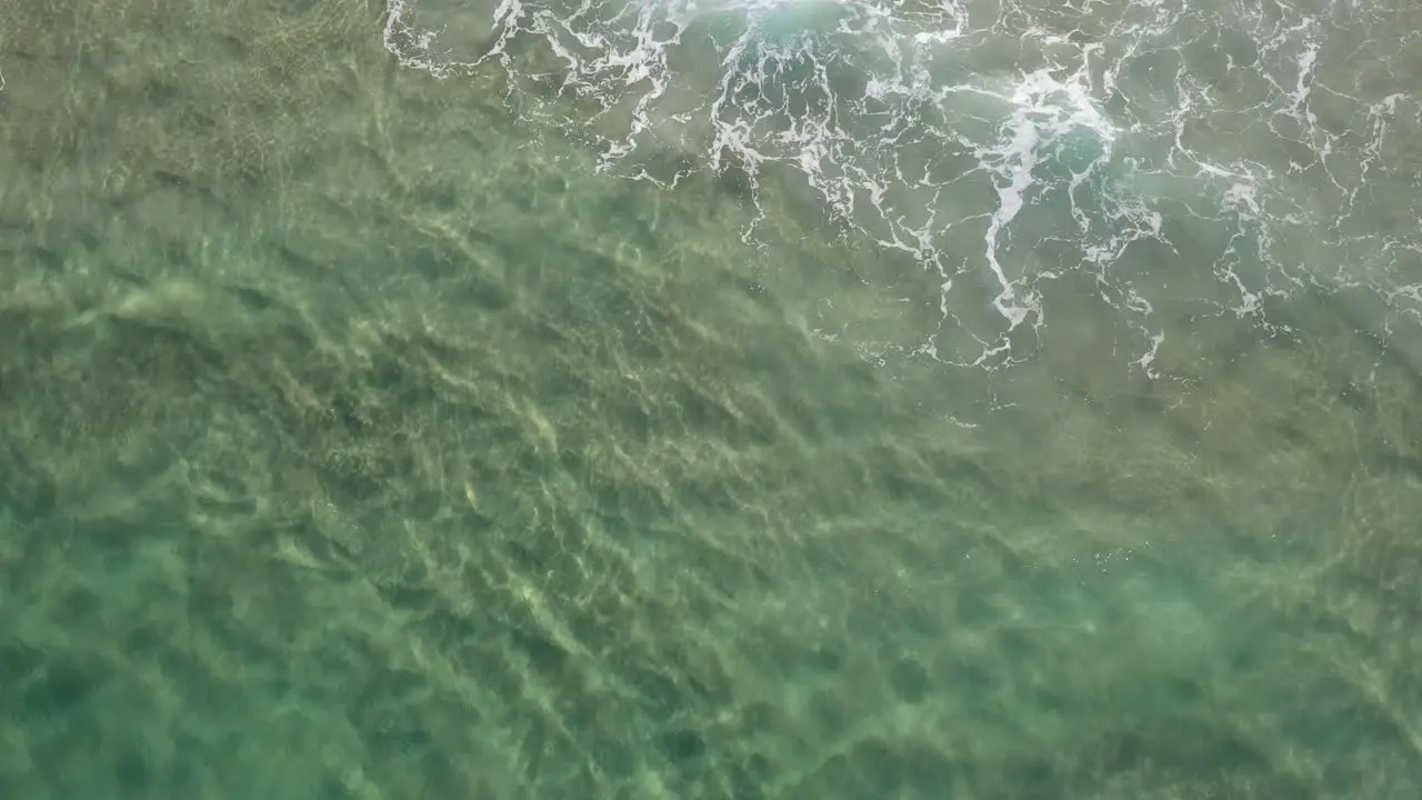 Aerial view over pristine crystal clear water-1