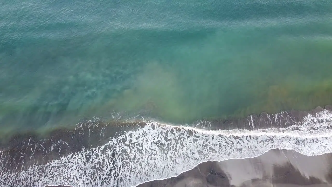 Drone shot of wave in the seashore