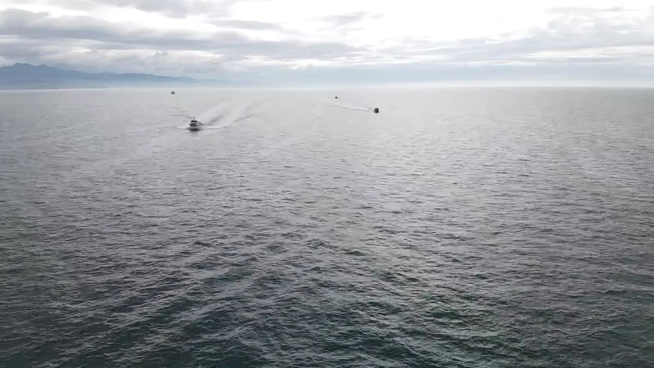 Boats Scramble to fish at sea