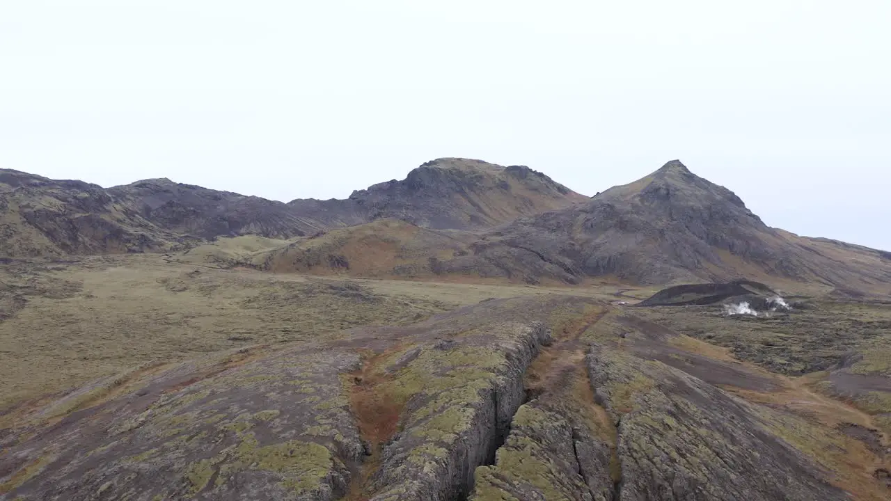 Volcanic surface of earth in geothermal region of Iceland aerial