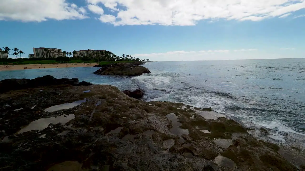 Waves crashing over Oahu's the volcanic rocks