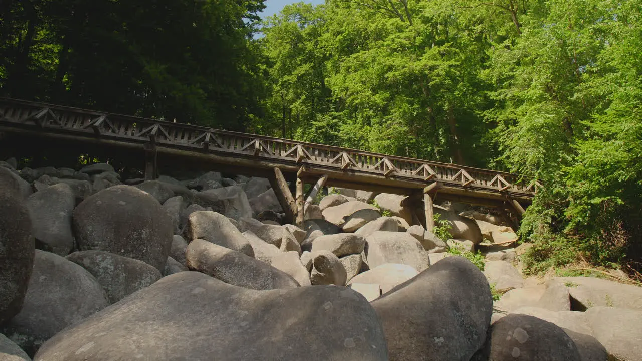 Felsenmeer in Odenwald Sea of rocks with bridge Wood Nature Tourism on a sunny day steady shot