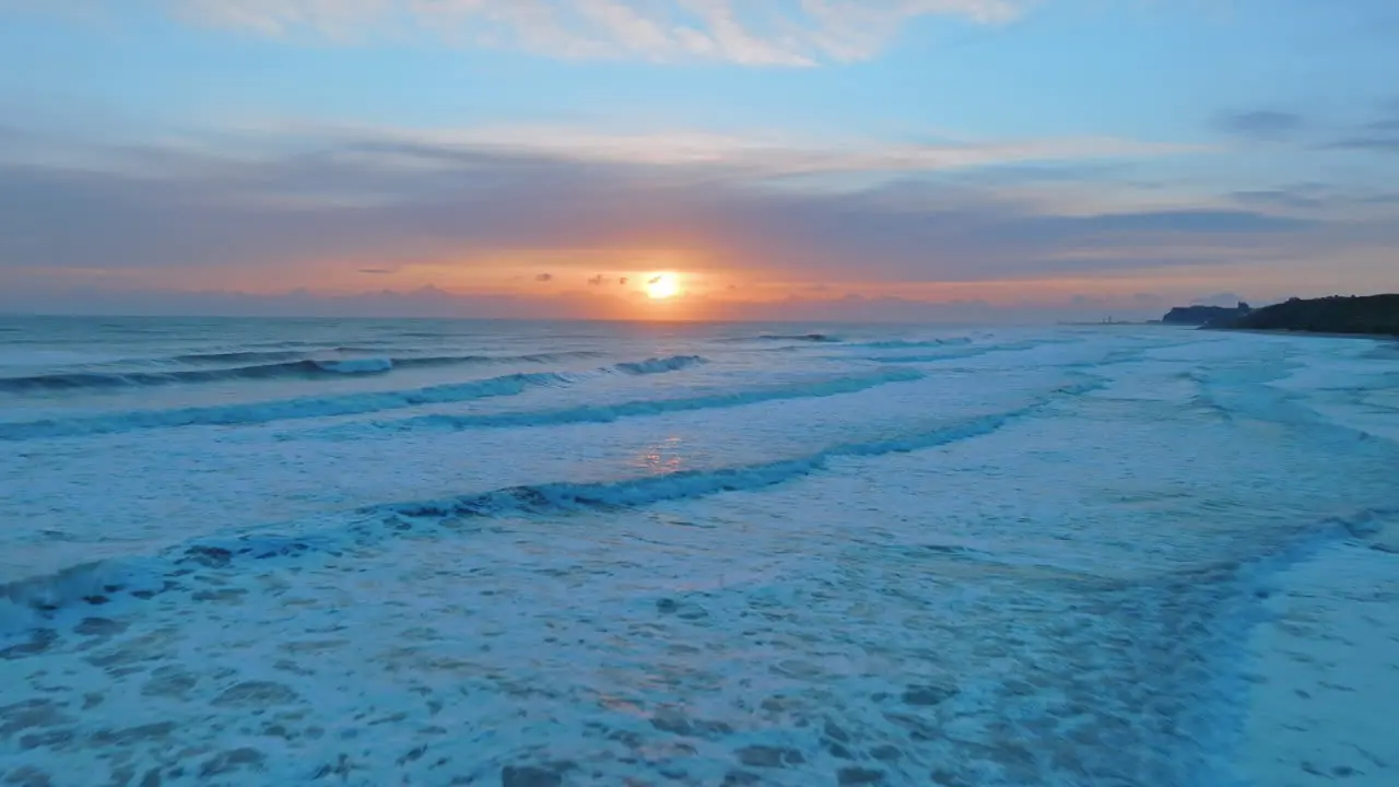 Sandsend near whitby subdued sunrise April 2022 aerial drone push forward to shoreline