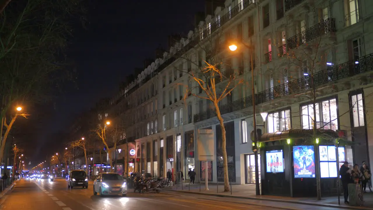 Street at night typical Hausmmn style boulevard in Paris France