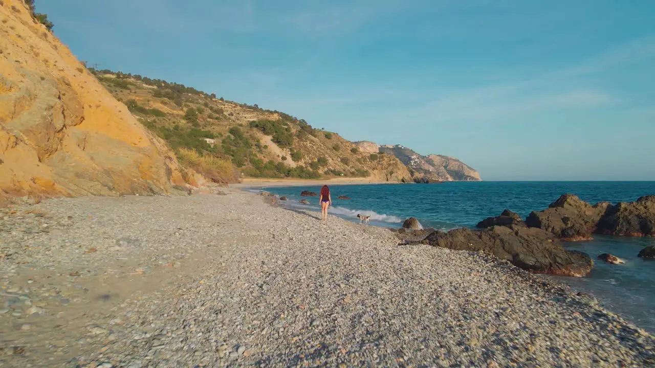 Drone moving forward and sideways at a rocky beach