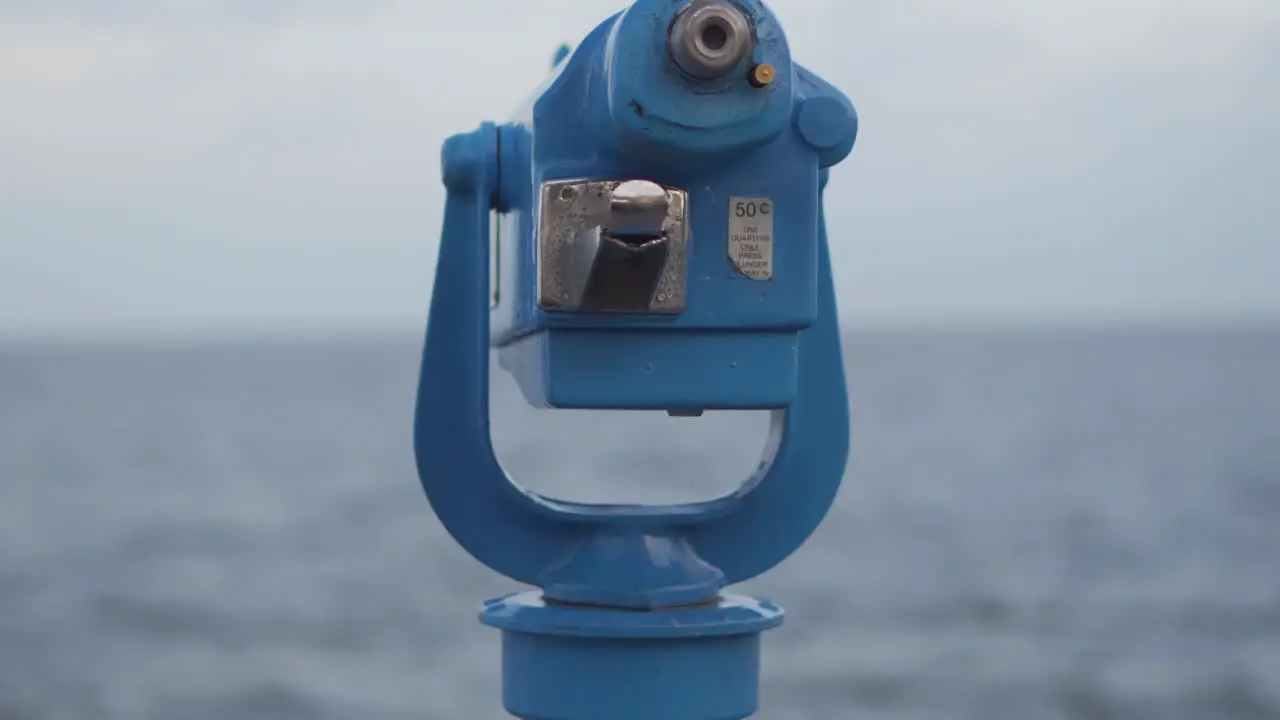 Public Telescope with Ocean in Background