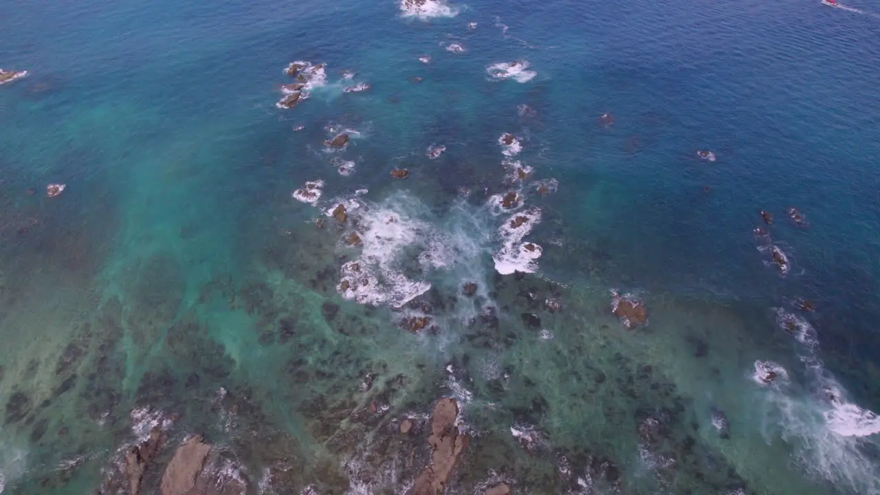 Tilt Up Shot From Green Land Unveiling Stunning Blue Ocean Landscape Trevallyn Australia