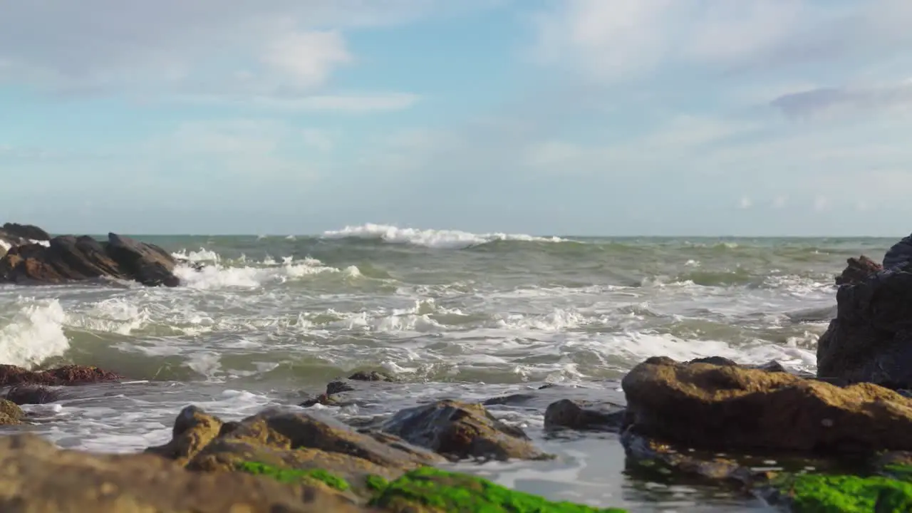 Rough waves crashing at the rocks