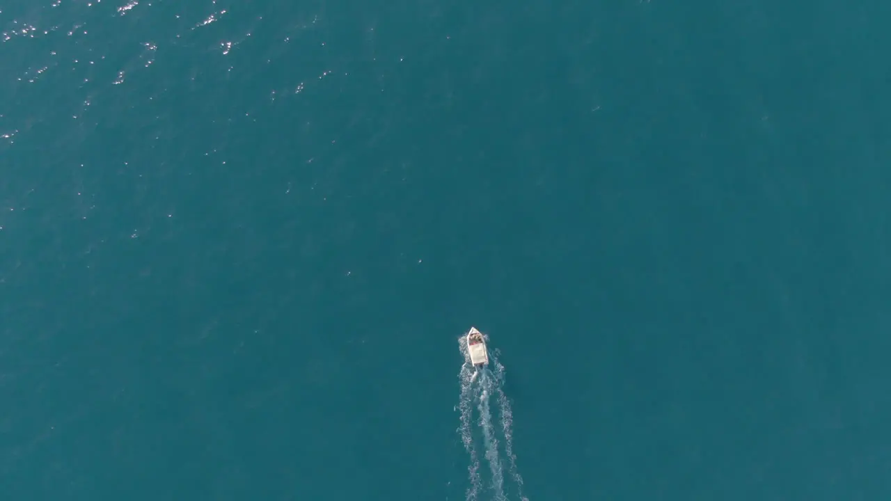 Top view of boat sailing to an island in Lefkada