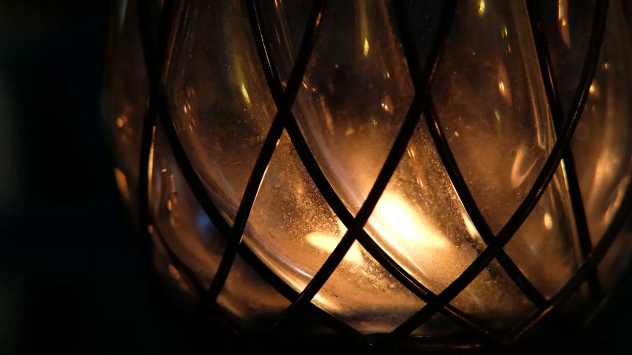 Lantern with candle close up at dark night