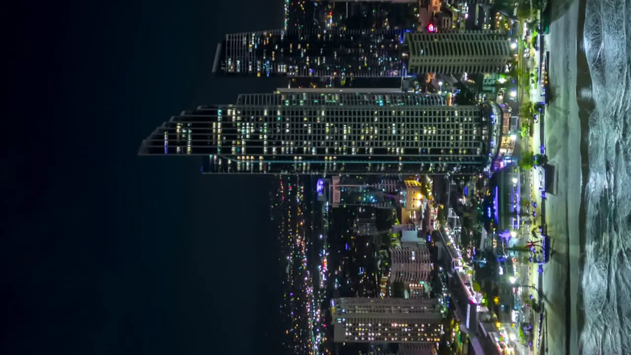 Aerial vertical video tracking along Surfer's paradise's skyline Gold Coast Australia