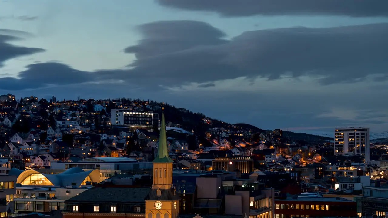 Twilight time lapse of Tromso city settling in for the night Norway