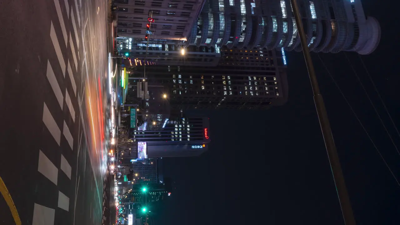 Seoul Night Cars Traffic on Sejong-daero and Jong-ro road Gwanghwamun Station Crossroad Vertical static